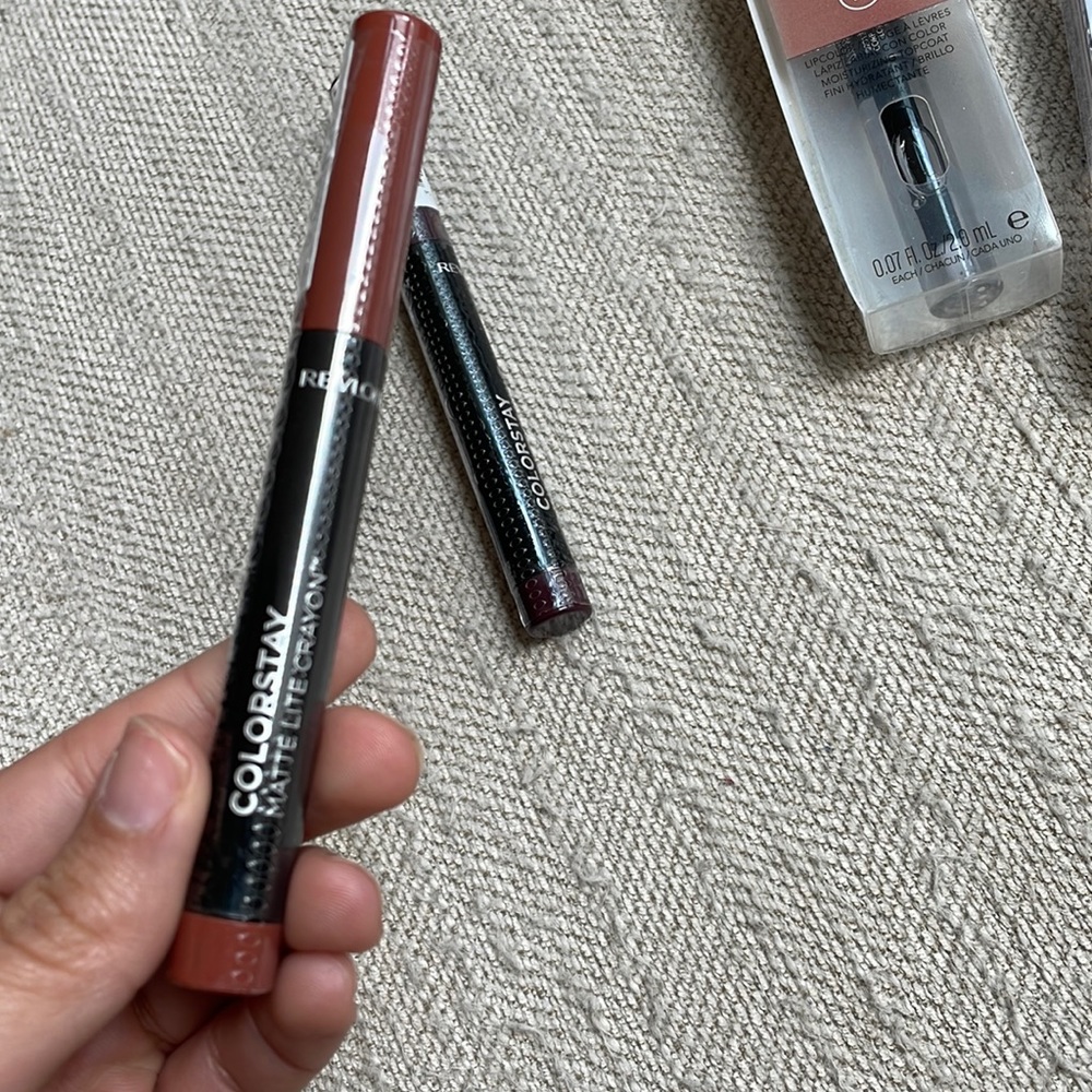 Lip crayon - clear the air (brownish)  , lip wine (plumish color) .